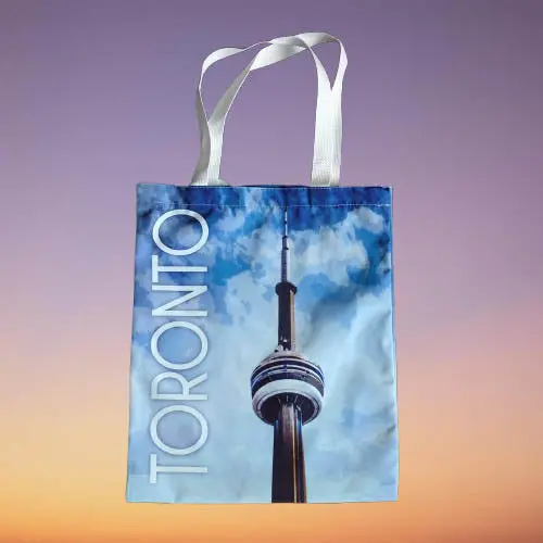 02-0415 – Toronto-Themed Tote Bag Featuring Cn Tower & Blue Sky Illustration 1